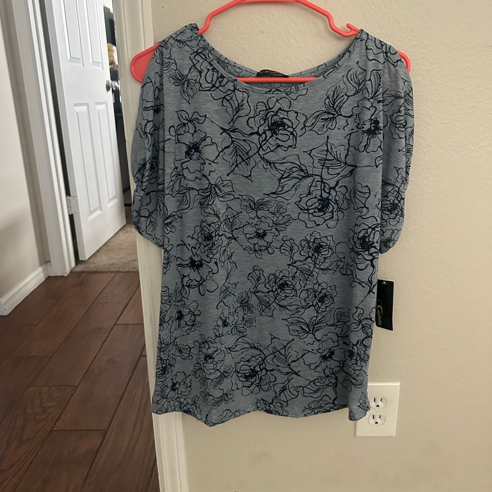Of the shoulders blue floral blouse